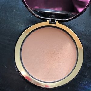 Too faced powder in medium to tan